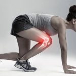 A side-profile view of an active woman in a workout pose, with a highlighted red glowing area over her knee joint to indicate pain, stiffness, or injury.
