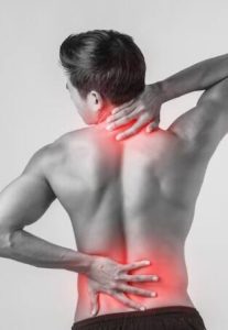 A man experiencing pain in his neck and lower back, with red highlights indicating areas of physical discomfort.